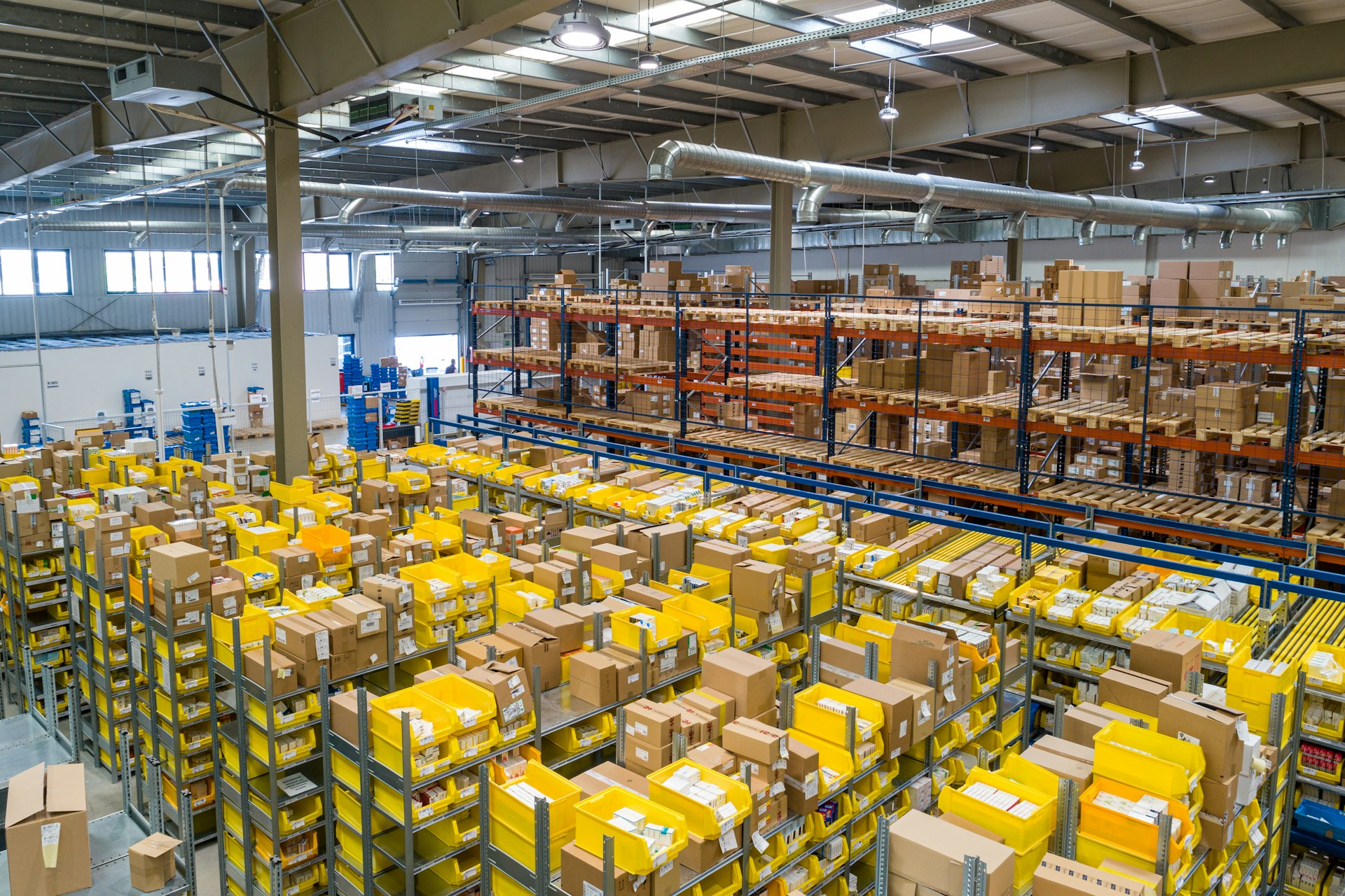 Warehouse shipping logistics for courier hard-drive handoffs
